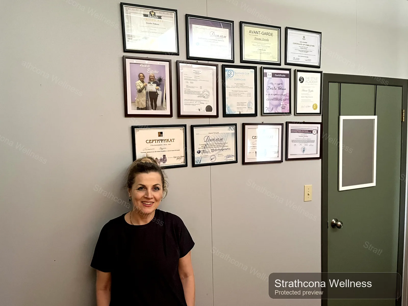 Provider portrait with certificate wall at Strathcona Wellness